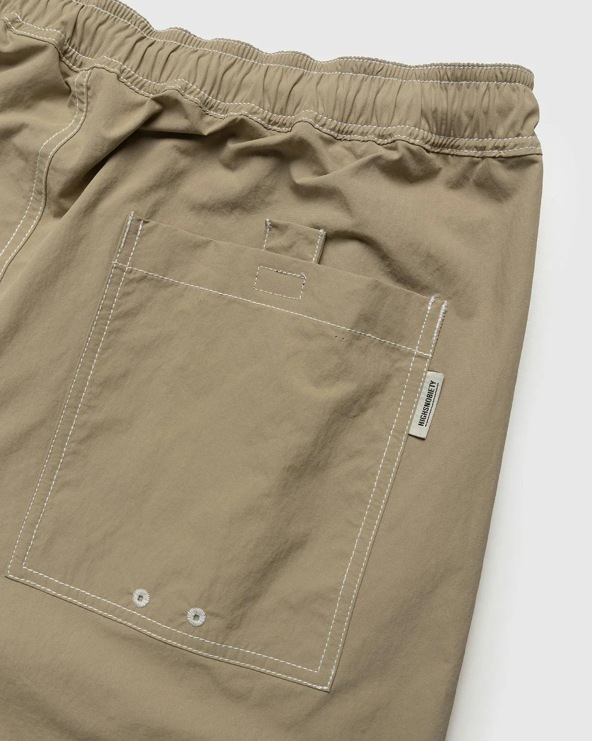 Highsnobiety – Contrast Brushed Nylon Elastic Pants Beige | Highsnobiety Shop